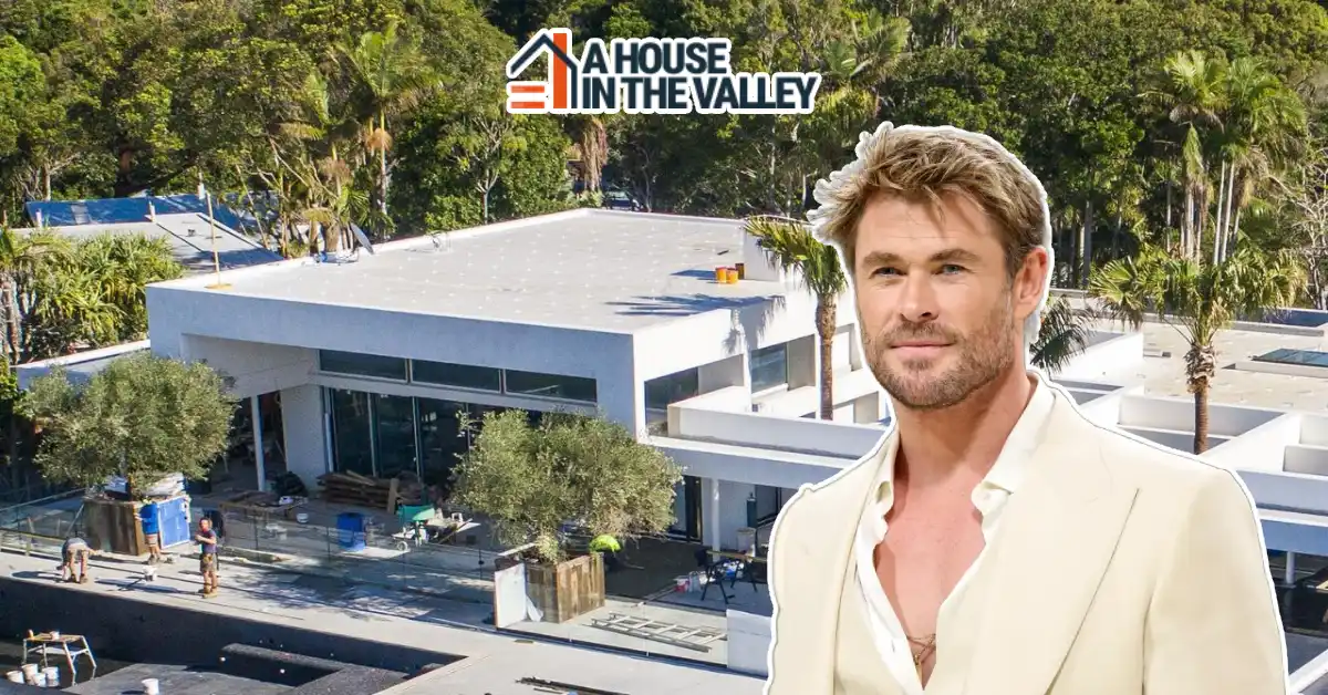 Aerial view of Chris Hemsworth House in Byron Bay, showcasing a modern white mansion surrounded by lush greenery and luxury outdoor spaces.