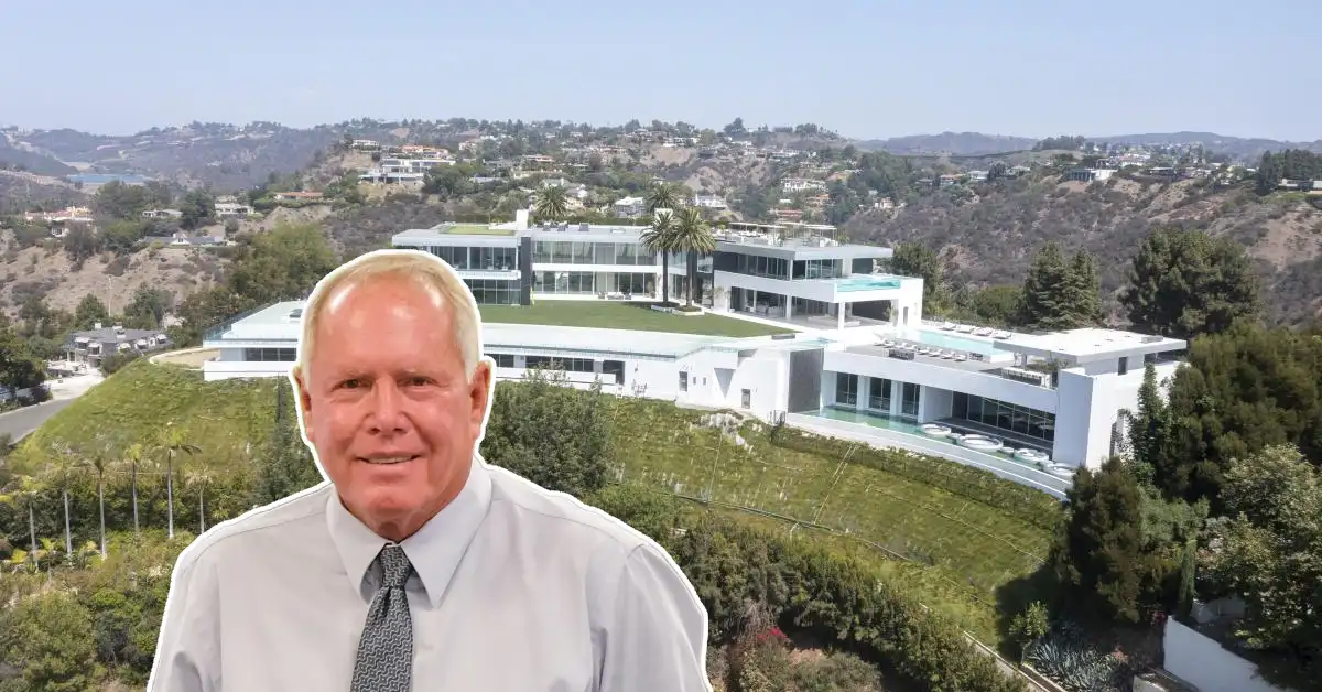 Don Hankey House—luxurious modern mansion with expansive glass walls, surrounded by lush landscaping and panoramic hillside views.