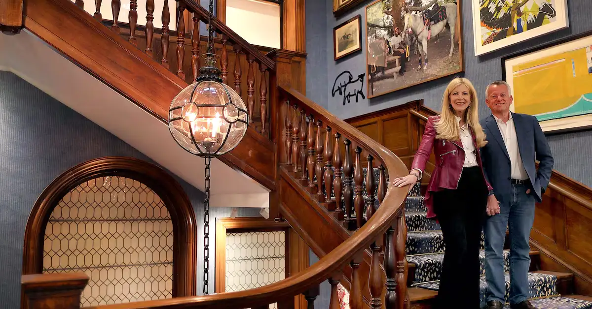 Paul Edgerley House interior showcasing elegant staircase with Tudor Revival architecture and luxury design elements in Fisher Hill Boston